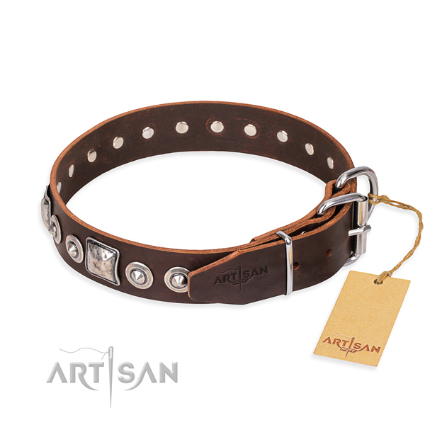 Full grain natural leather dog collar made of soft to touch material with corrosion resistant adornments